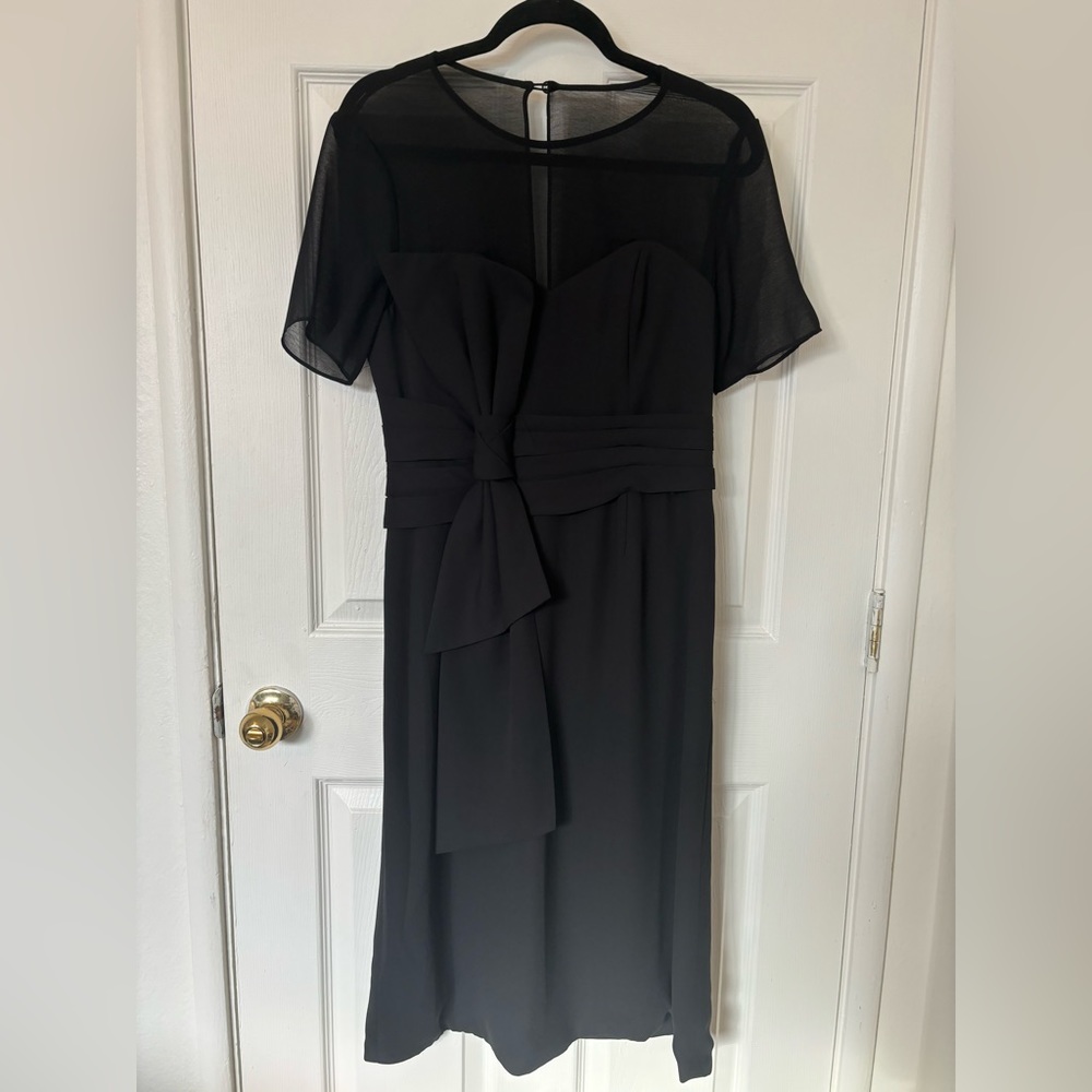 I am selling a beautiful black dinner dress
